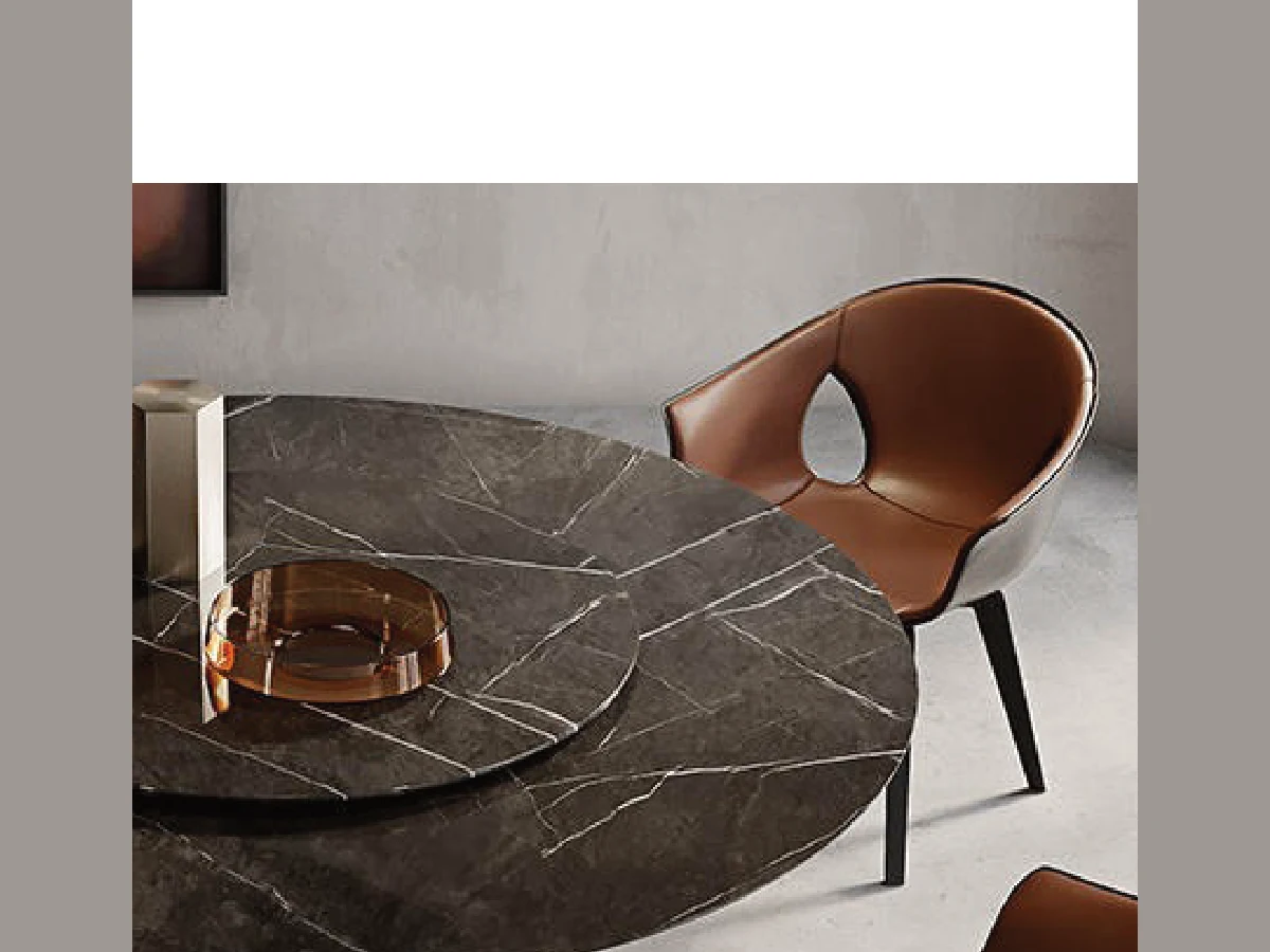 Round MAVORA dining table in a contemporary interior